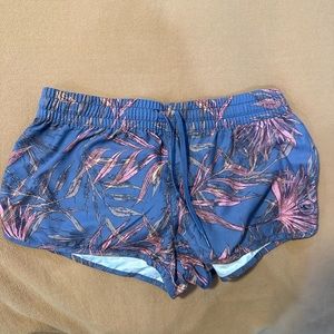 Tropical pink and purple O’Neil swim trunks